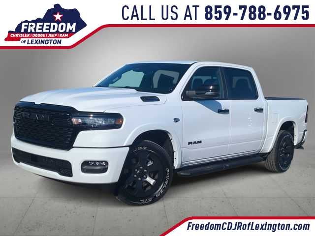 2026 RAM 1500 RAM 1500 BIG HORN CREW CAB 4X4 5'7' BOX in Bright White Clear-Coat Exterior Paint — front three-quarter view
