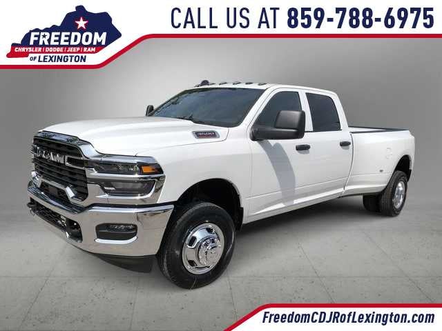 2026 RAM 3500 RAM 3500 TRADESMAN CREW CAB 4X4 8' BOX in Bright White Clear-Coat Exterior Paint — front three-quarter view