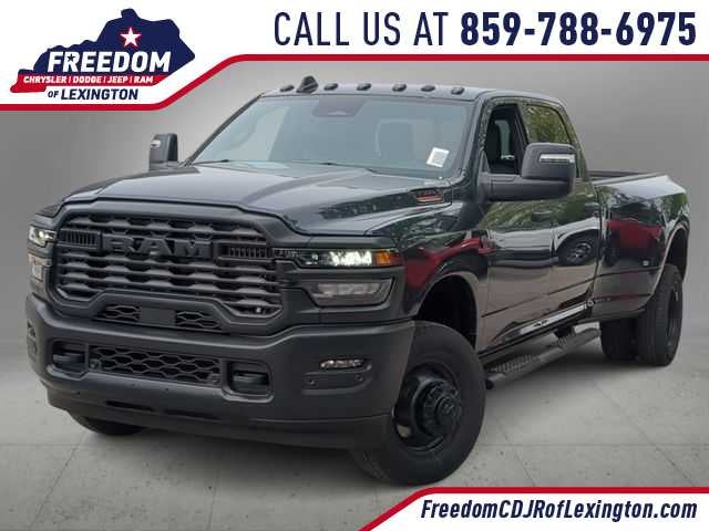 2026 RAM 3500 RAM 3500 TRADESMAN CREW CAB 4X4 8' BOX in Forged Blue Metallic Exterior Paint — front three-quarter view