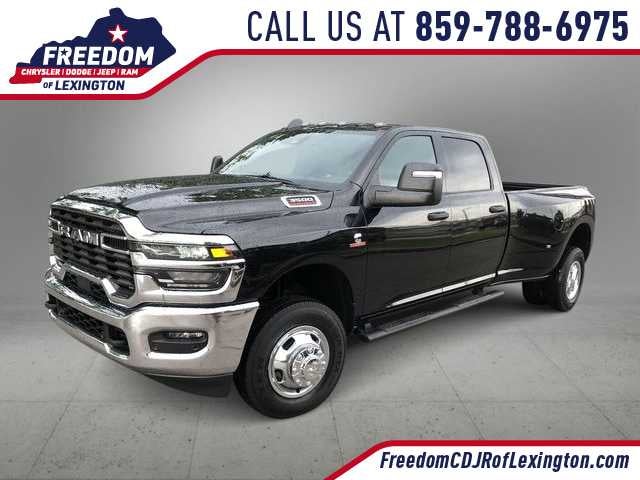 2026 RAM 3500 RAM 3500 TRADESMAN CREW CAB 4X4 8' BOX in Diamond Black Crystal Pearl-Coat Exterior Paint — front three-quarter view