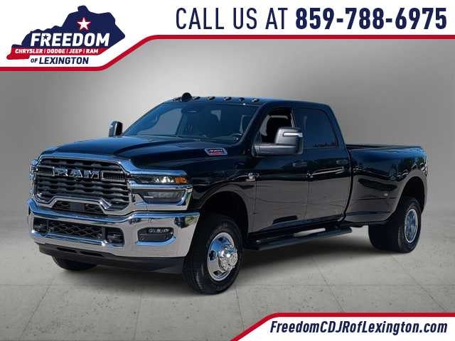 2026 RAM 3500 RAM 3500 TRADESMAN CREW CAB 4X4 8' BOX in Diamond Black Crystal Pearl-Coat Exterior Paint — front three-quarter view
