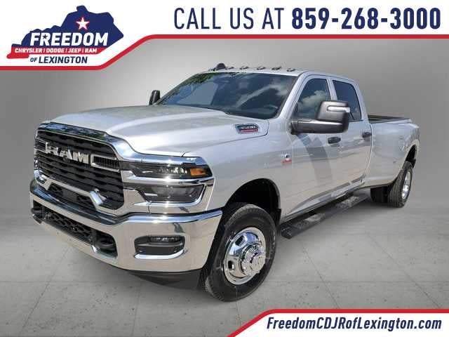 2026 RAM 3500 RAM 3500 TRADESMAN CREW CAB 4X4 8' BOX in Silver-Zynith Exterior Paint — front three-quarter view