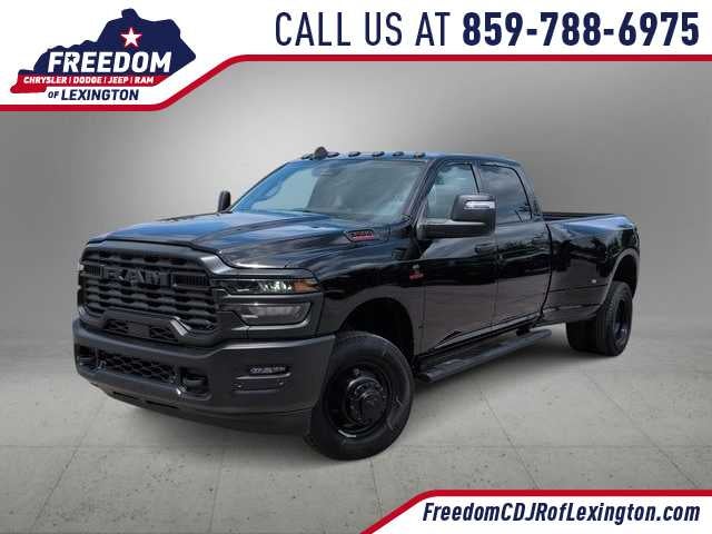 2026 RAM 3500 RAM 3500 TRADESMAN CREW CAB 4X4 8' BOX in Diamond Black Crystal Pearl-Coat Exterior Paint — front three-quarter view