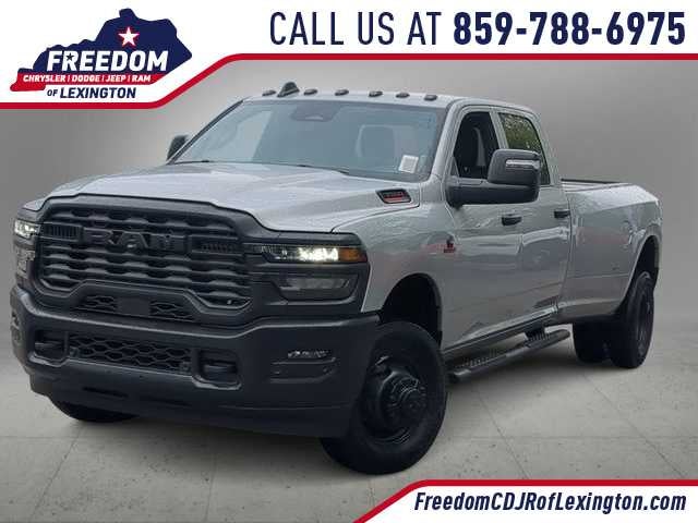 2026 RAM 3500 RAM 3500 TRADESMAN CREW CAB 4X4 8' BOX in Silver-Zynith Exterior Paint — front three-quarter view