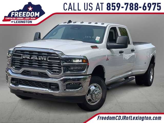 2026 RAM 3500 RAM 3500 TRADESMAN CREW CAB 4X4 8' BOX in Bright White Clear-Coat Exterior Paint — front three-quarter view