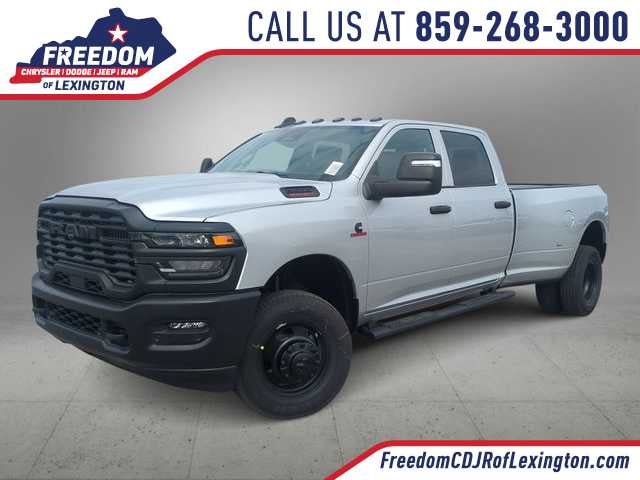 2026 RAM 3500 RAM 3500 TRADESMAN CREW CAB 4X4 8' BOX in Silver-Zynith Exterior Paint — front three-quarter view