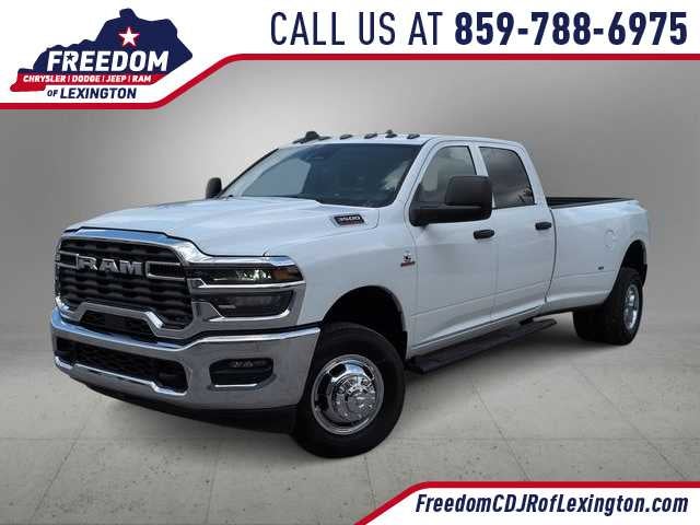 2026 RAM 3500 RAM 3500 TRADESMAN CREW CAB 4X4 8' BOX in Bright White Clear-Coat Exterior Paint — front three-quarter view