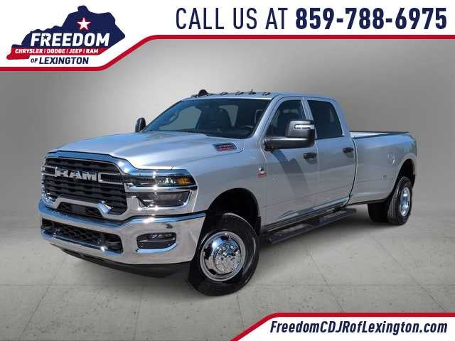 2026 RAM 3500 RAM 3500 TRADESMAN CREW CAB 4X4 8' BOX in Silver-Zynith Exterior Paint — front three-quarter view