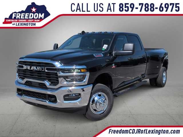 2026 RAM 3500 RAM 3500 TRADESMAN CREW CAB 4X4 8' BOX in Diamond Black Crystal Pearl-Coat Exterior Paint — front three-quarter view