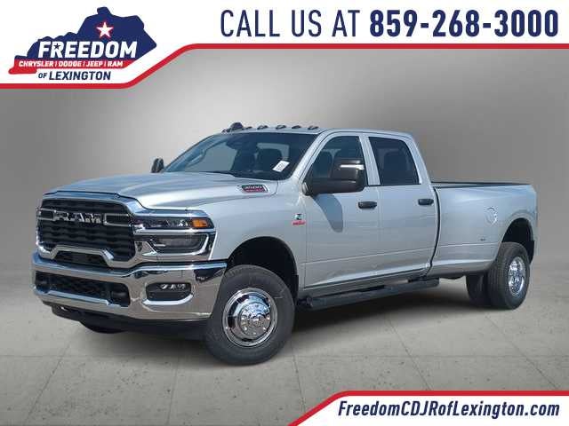 2026 RAM 3500 RAM 3500 TRADESMAN CREW CAB 4X4 8' BOX in Silver-Zynith Exterior Paint — front three-quarter view