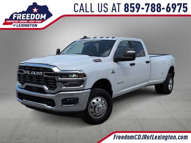 2026 RAM 3500 RAM 3500 BIG HORN CREW CAB 4X4 8' BOX in Bright White Clear-Coat Exterior Paint — front three-quarter view
