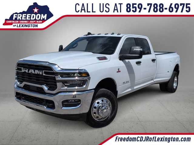 2026 RAM 3500 RAM 3500 BIG HORN CREW CAB 4X4 8' BOX in Bright White Clear-Coat Exterior Paint — front three-quarter view