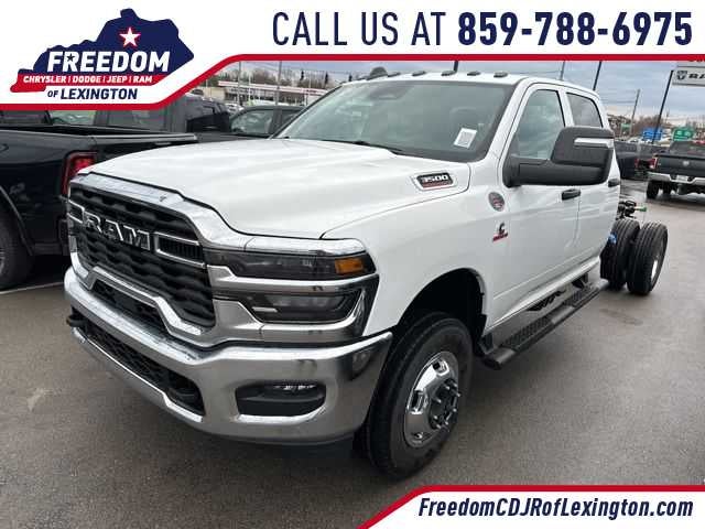 2026 RAM 3500 Chassis Cab RAM 3500 TRADESMAN CREW CAB CHASSIS 4X4 60' CA in Bright White Clear-Coat Exterior Paint — front three-quarter...