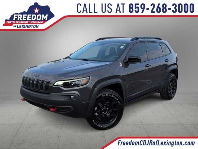 2022 Jeep Cherokee Trailhawk in Granite Crystal Metallic Clearcoat — front three-quarter view