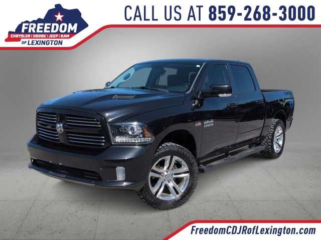 2016 RAM 1500 Sport in Brilliant Black Crystal Pearlcoat — front three-quarter view