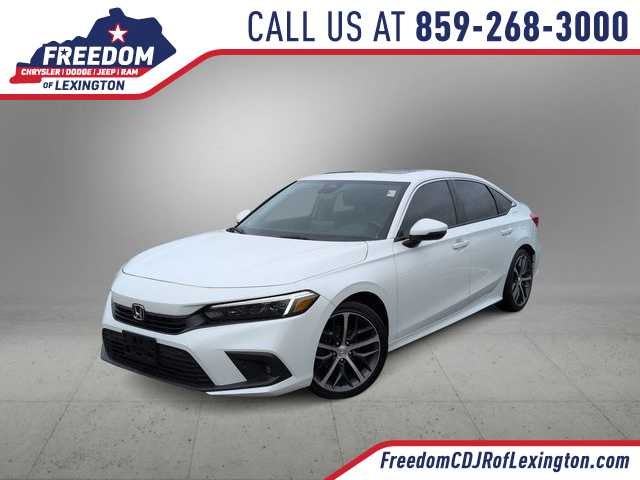 2023 Honda Civic Touring in Platinum White Pearl — front three-quarter view