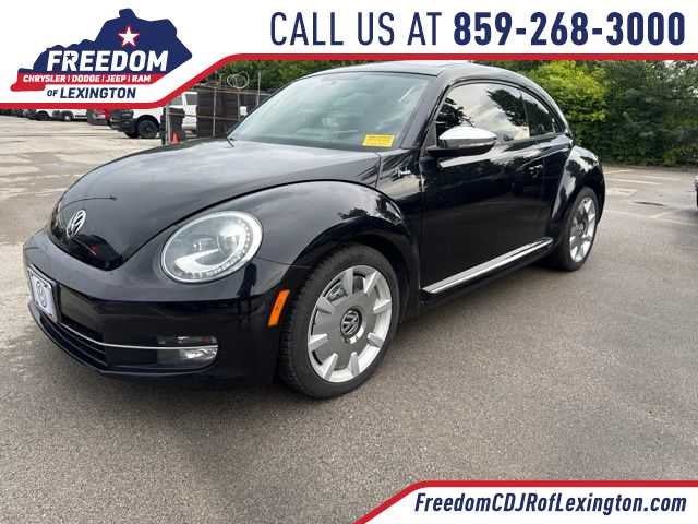 2013 Volkswagen Beetle Base in Black — front three-quarter view