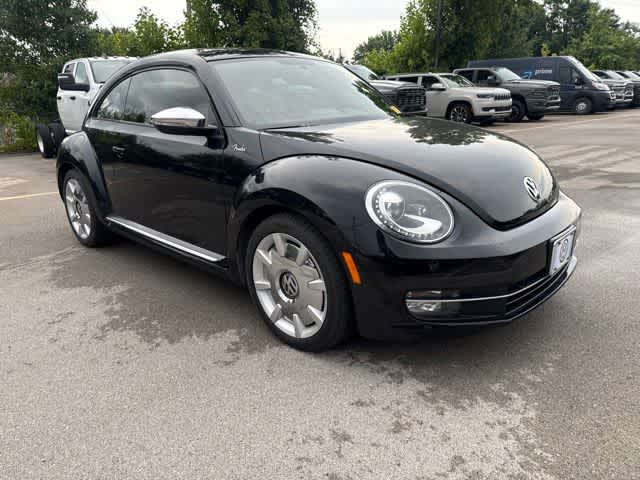 2013 Volkswagen Beetle — rear three-quarter view