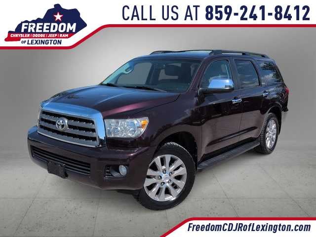 2014 Toyota Sequoia Limited in Sizzling Crimson Mica — front three-quarter view