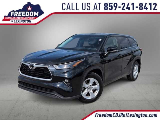 2023 Toyota Highlander LE in Midnight Black Metallic — front three-quarter view