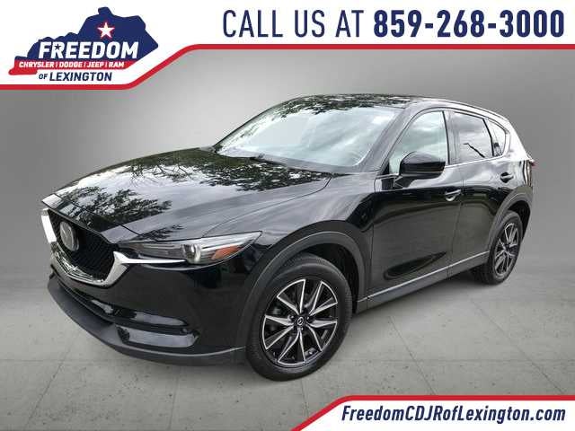 2017 Mazda Mazda CX-5 Grand Touring in Jet Black Mica — front three-quarter view