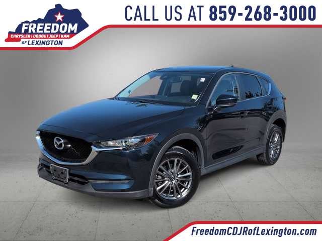 2017 Mazda Mazda CX-5 Touring in Deep Crystal Blue Mica — front three-quarter view